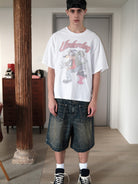 UNKNOWNWORLD Mud Dye Reverse Pocket Shorts in Yellow - On Male Model