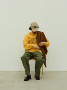 USAGE Heavyweight Herringbone Twill Belted Trousers in Olive - On Male Model