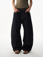 BLINDNOPLAN Curved Wide Leg Raw Denim Jeans in Denim - On Model