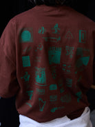 USAGE JZ Festival Graphic Cotton T Shirt in Brown - On Model