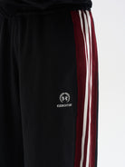 BLINDNOPLAN Raw Edge Contrast Paneled Sweatpants in Black - On Model