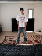 UNKNOWNWORLD Ice Blue Washed Micro Flare Jeans in Blue - On Male Model