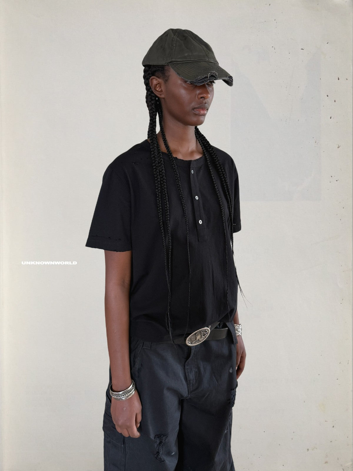 UNKNOWNWORLD Distressed Cotton Henley T Shirt in Black - On Female Model