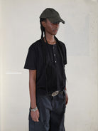 UNKNOWNWORLD Distressed Cotton Henley T Shirt in Black - On Female Model