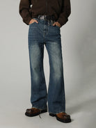 MASONPRINCE High Waisted Distressed Flared Jeans in Navy Blue - On Model