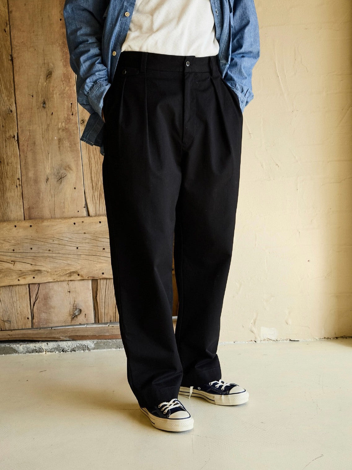 USAGE Pleated Cotton Twill Chinos in Black - On Model