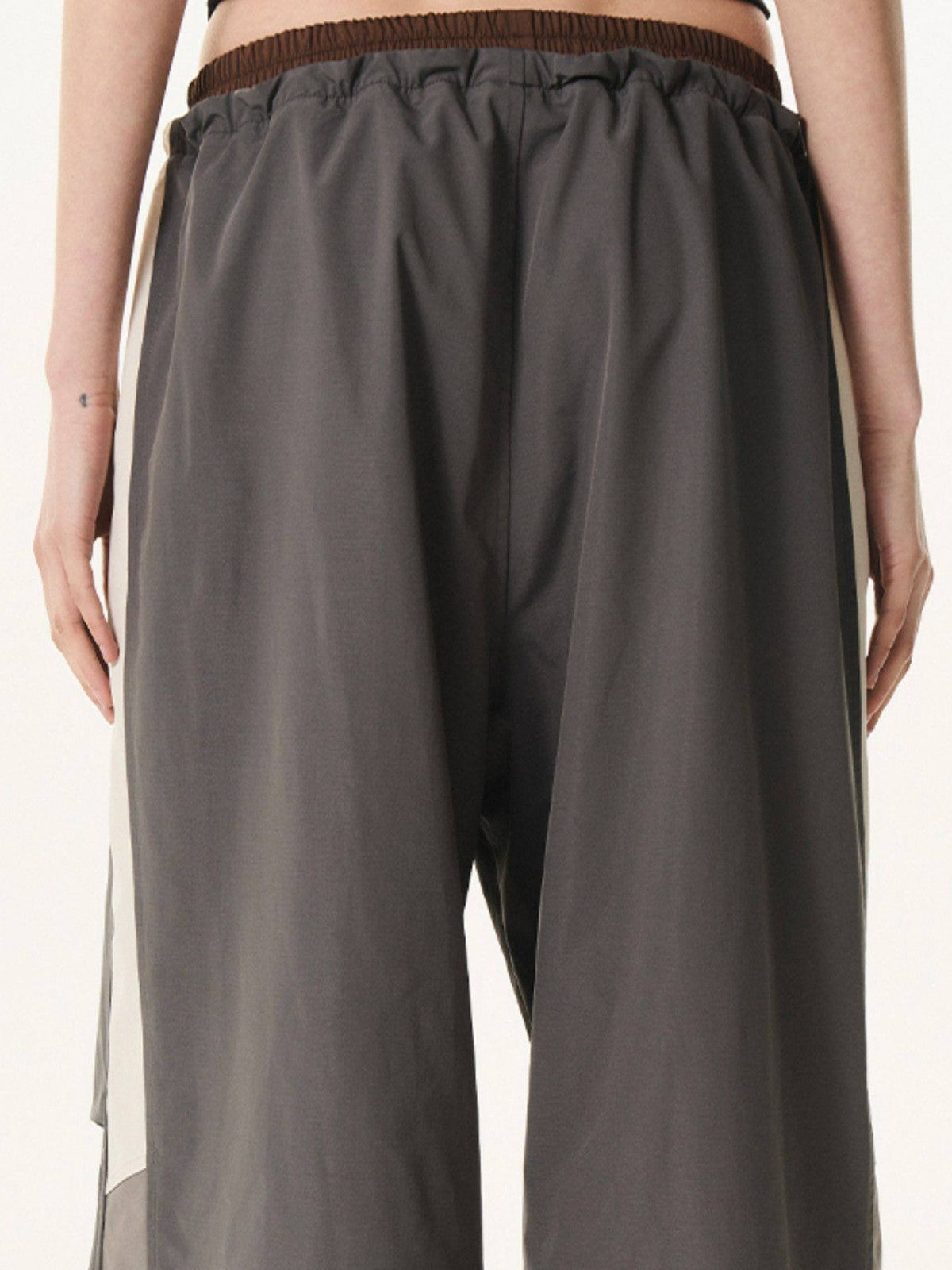 BLINDNOPLAN Contrast Panel Pleated Parachute Pants in Gray - On Model