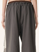 BLINDNOPLAN Contrast Panel Pleated Parachute Pants in Gray - On Model