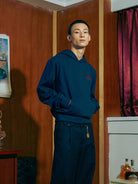 SOD Embroidered Padded Shoulder Hoodie in Blue - On Male Model
