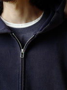 USAGE Hand Distressed Washed Zip Hoodie in Navy Blue - On Male Model