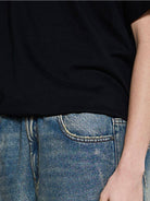 BLINDNOPLAN Distressed Washed Straight Jeans in Blue - On Model