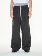 BLINDNOPLAN Double Waistband Pleated Sweatpants in Dark Gray - On Model