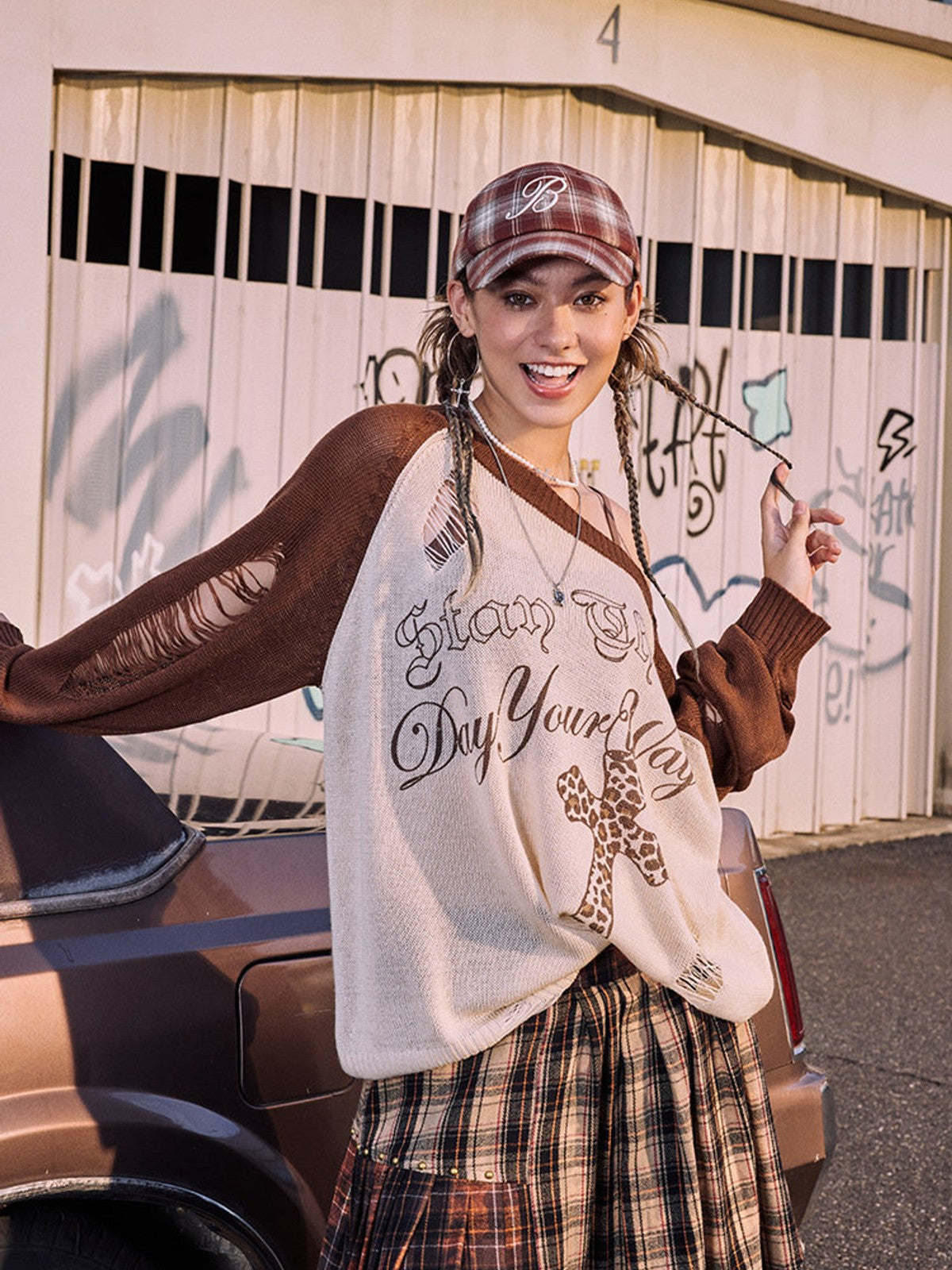 BEERBRO Distressed Graphic Off Shoulder Sweater in White - On Female Model
