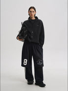 MASONPRINCE Convertible Layered Cotton Skirt Shorts in Black - On Male Model