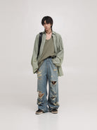 MASONPRINCE High Waisted Distressed Straight Leg Jeans in Blue - On Male Model
