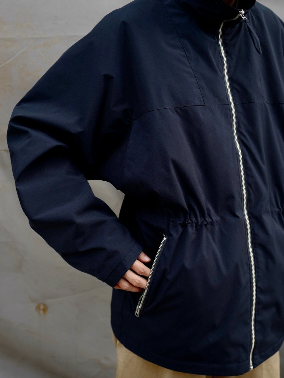 USAGE Drawstring Zip Front Tech Anorak in Navy Blue - On Male Model