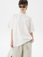 MASONPRINCE Exposed Seam Tape Print T Shirt in White - On Female Model