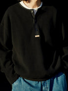 USAGE Heavyweight Waffle Knit Henley Sweatshirt in Black - On Male Model