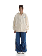MASONPRINCE Cotton Blend Zip Up Hoodie in White - On Female Model