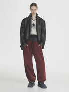 MASONPRINCE Wide Leg Inverted Pleat Sweatpants in Burgundy - On Female Model