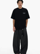 MASONPRINCE Graffiti Logo Cotton T Shirt in Black - On Male Model