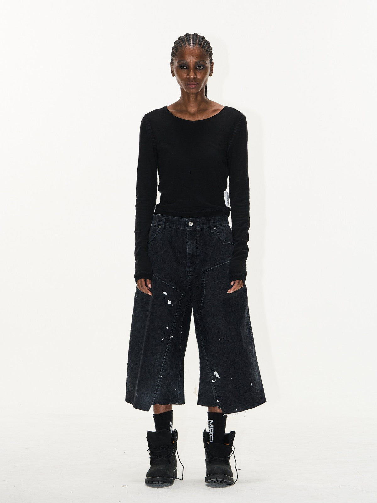 BLINDNOPLAN Ink Splatter Denim Carpenter Shorts in Black - On Female Model
