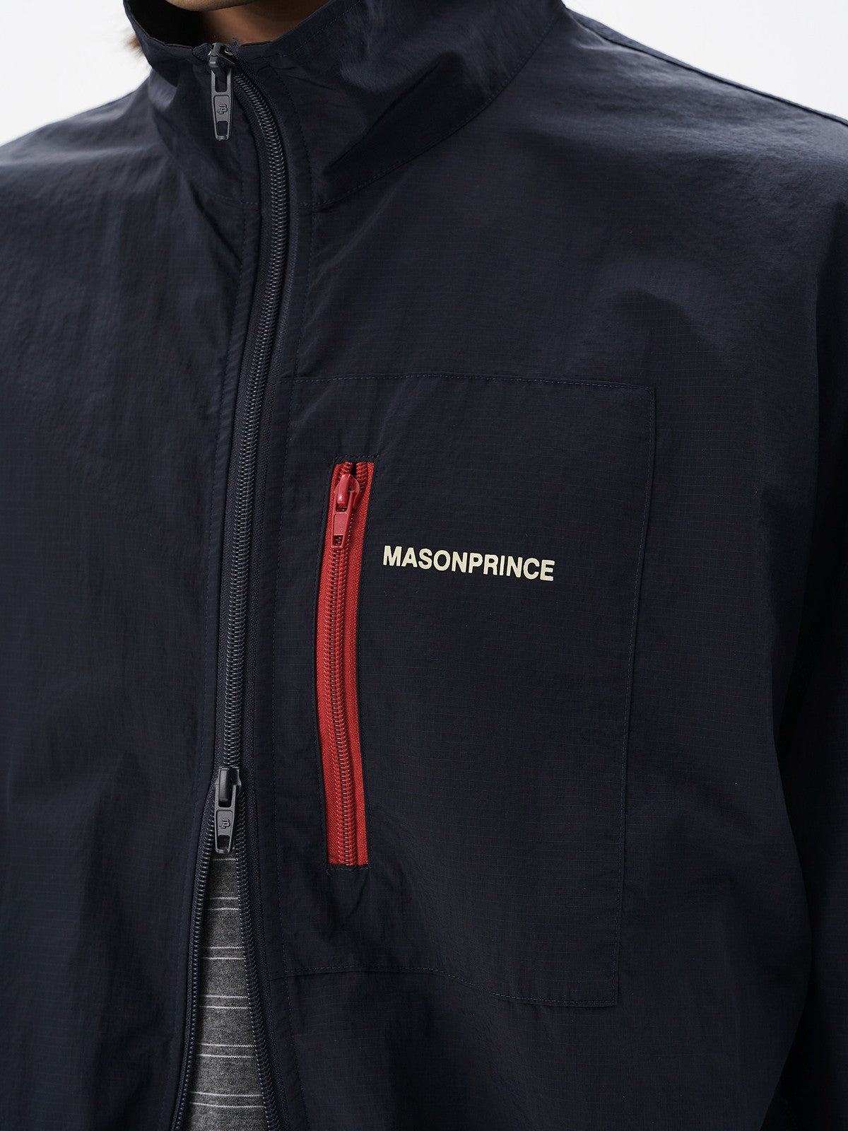 MASONPRINCE Lightweight Tonal Check Nylon Jacket in Navy Blue - On Model