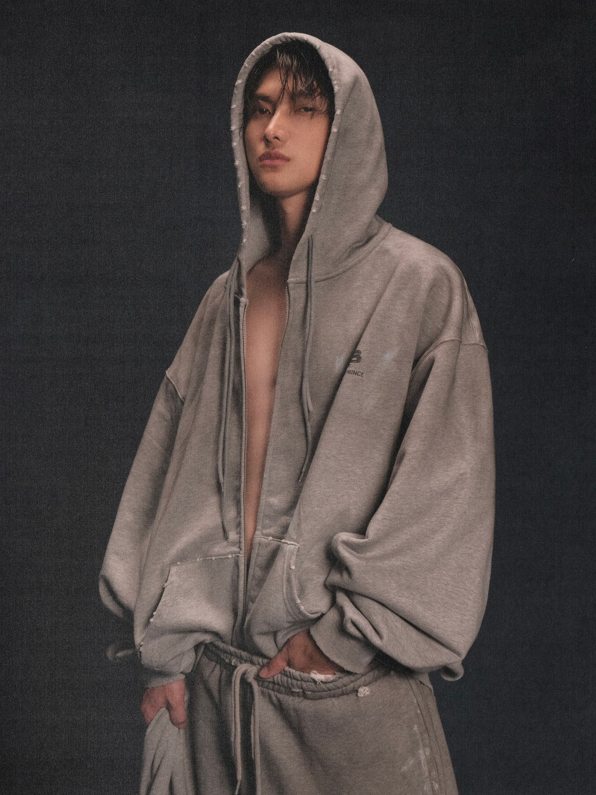 MASONPRINCE Distressed Painted Zip Up Hoodie in Gray - On Male Model