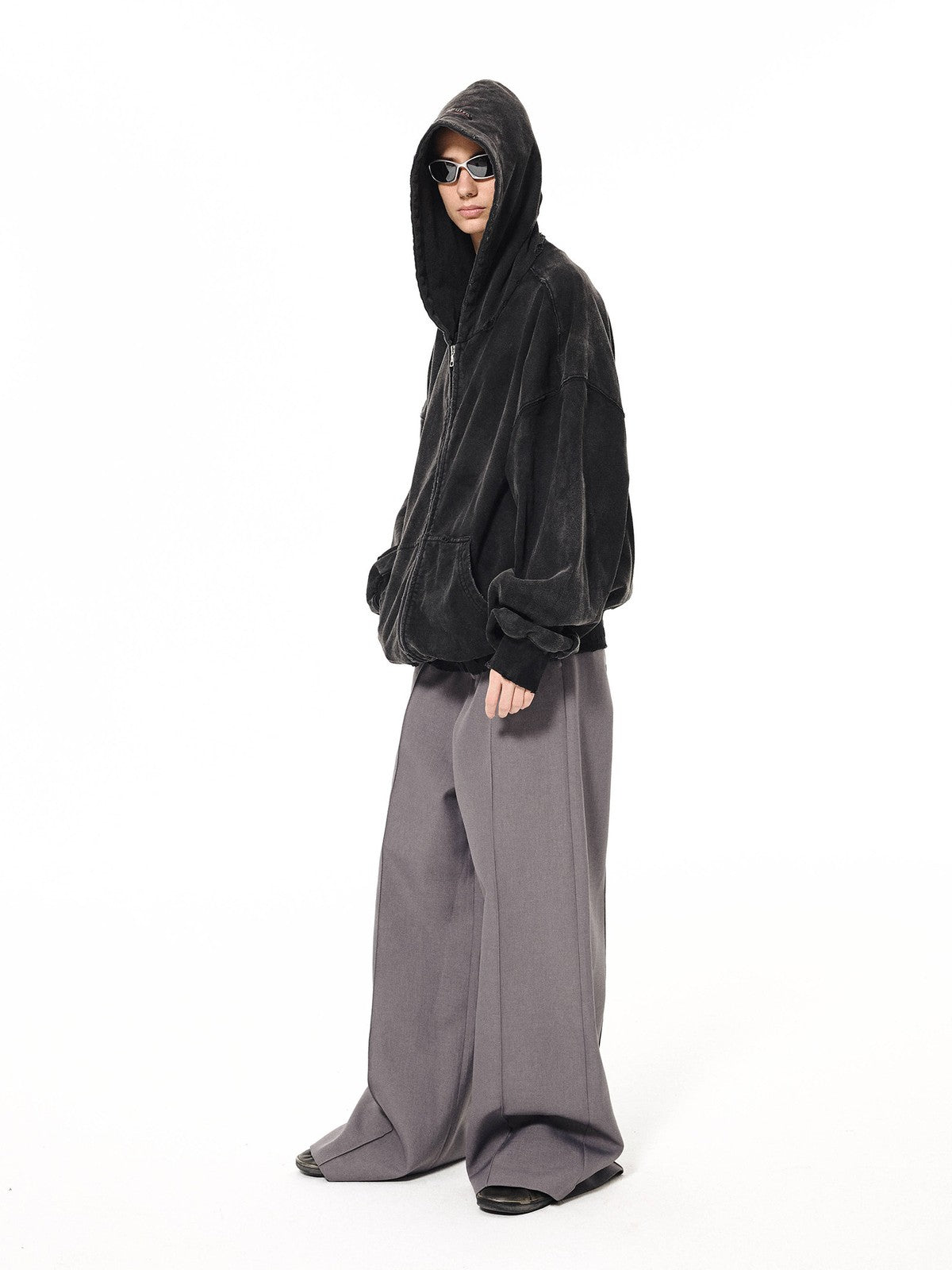 UNKNOWNWORLD Mud Dyed Zip Up Hoodie in Black - On Female Model