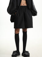 MASONPRINCE Striped Cotton Blend Track Shorts in Black - On Model