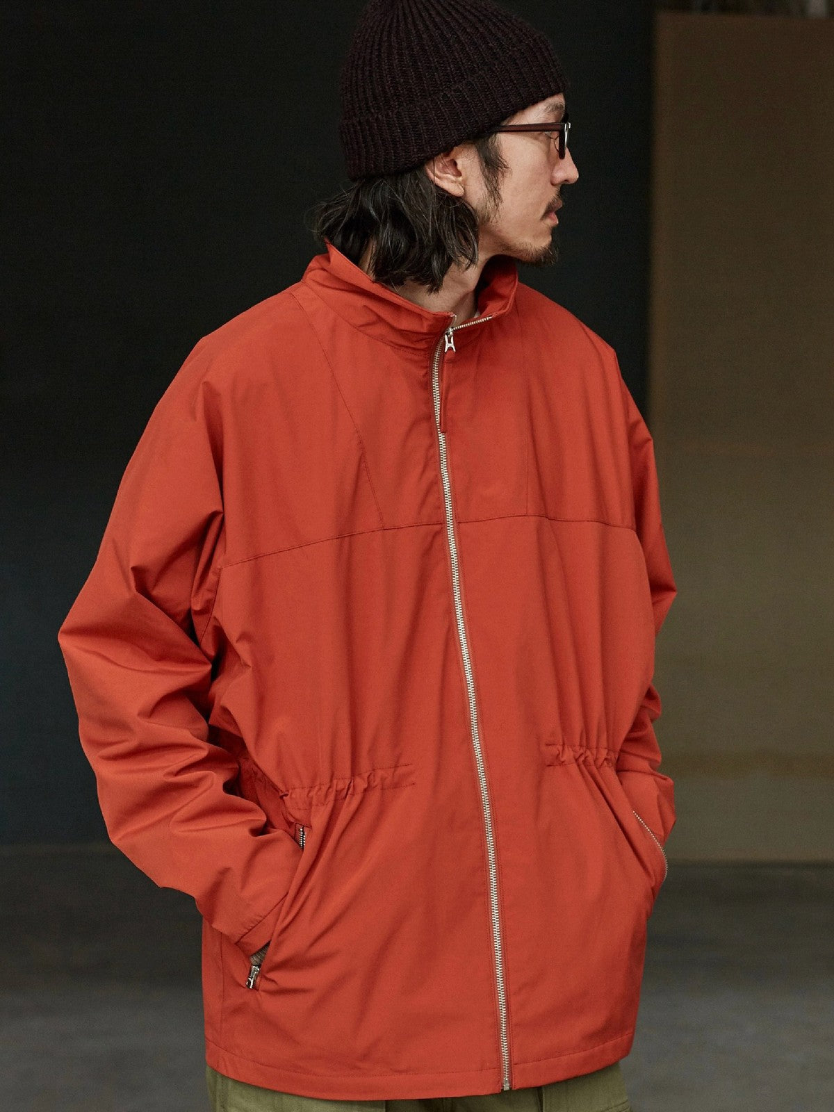 USAGE Drawstring Zip Front Tech Anorak in Orange - On Male Model