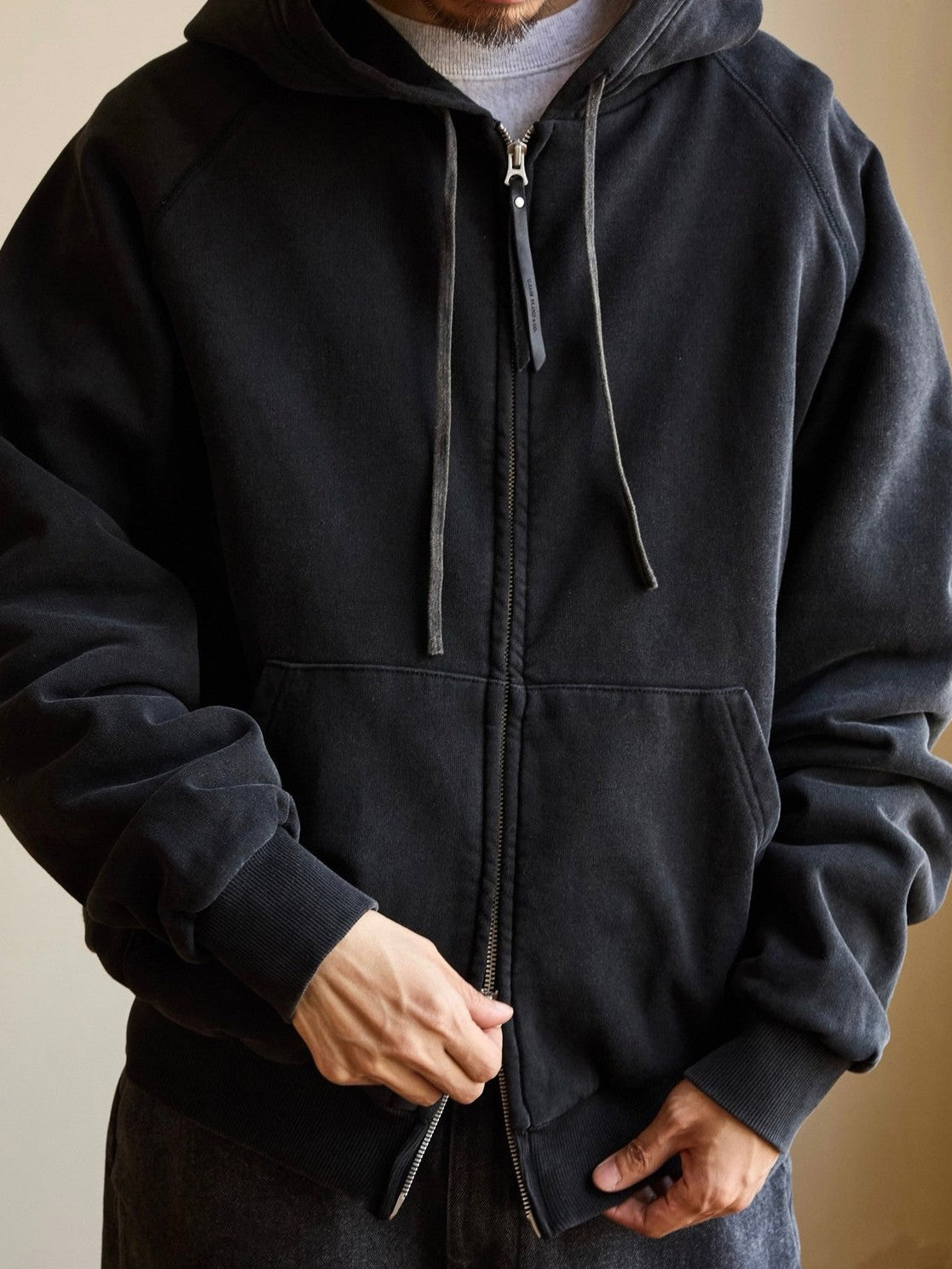 USAGE Vintage Washed Double Layer Zip Hoodie in Black - On Male Model