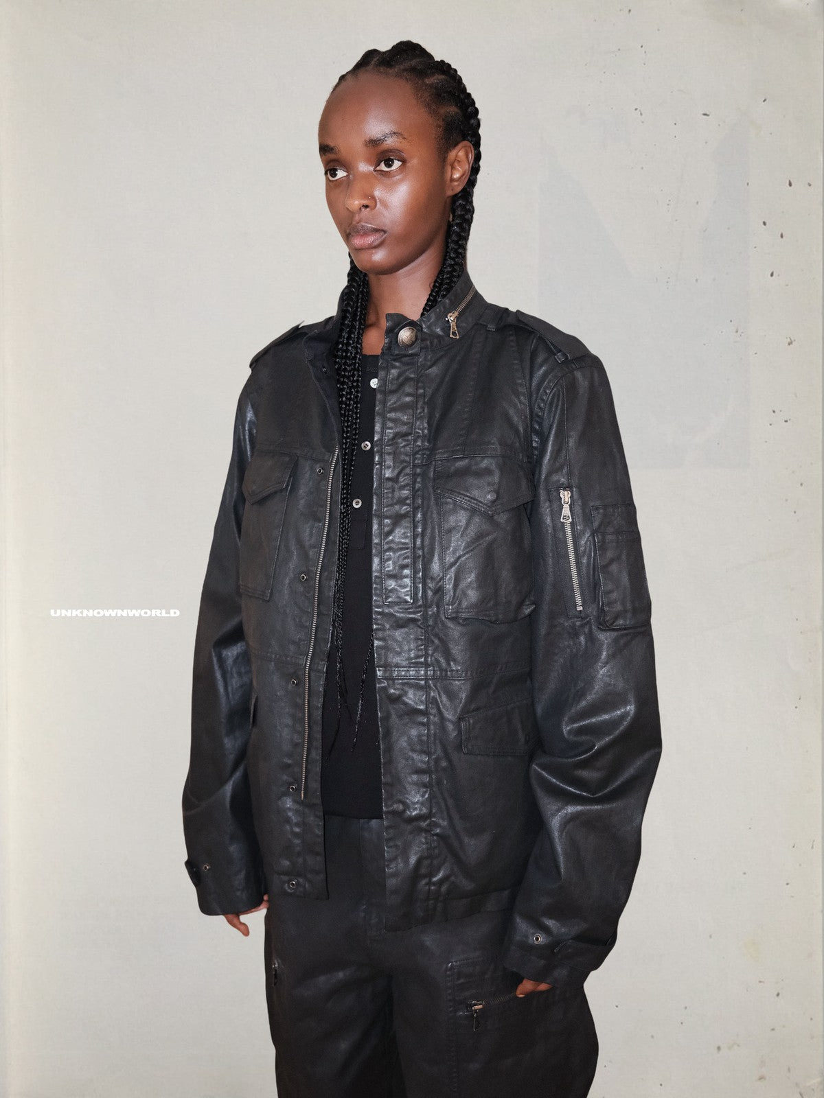 UNKNOWNWORLD Waxed Deconstructed M65 Jacket in Black - On Female Model