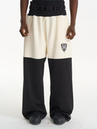 BLINDNOPLAN Color Block Wide Leg Sweatpants in Black - On Male Model