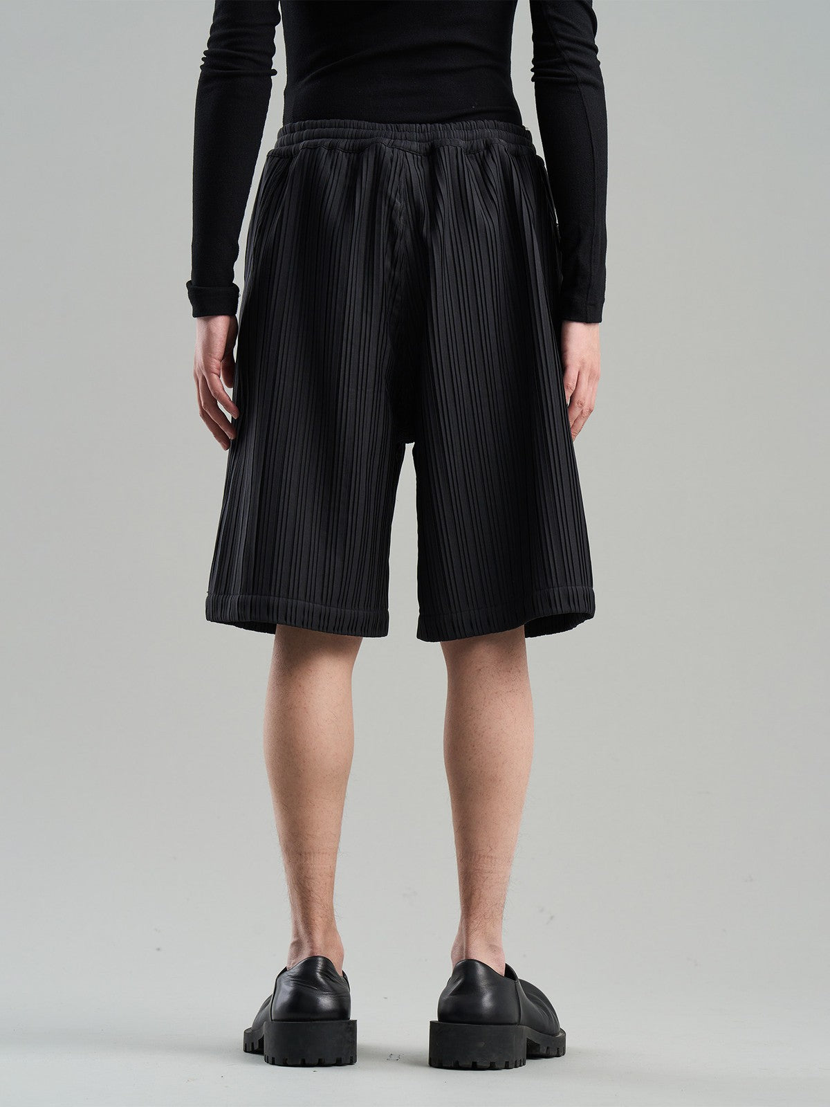 BLINDNOPLAN Textured Rivet Suit Shorts in Black - On Model