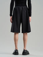 BLINDNOPLAN Textured Rivet Suit Shorts in Black - On Model