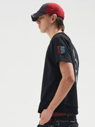BLINDNOPLAN Sorona Panelled Graphic T Shirt in Black - On Male Model