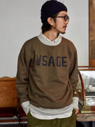 USAGE Graphic Two Tone Cotton Sweatshirt in Brown - On Male Model