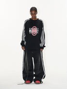 BLINDNOPLAN Color Block Graphic Raglan Sweatshirt in Black - On Female Model