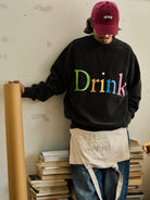 USAGE Washed Cotton Graphic Sweatshirt in Black - On Male Model