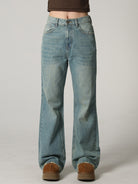 MASONPRINCE High Waisted Distressed Flared Jeans in Denim - On Model