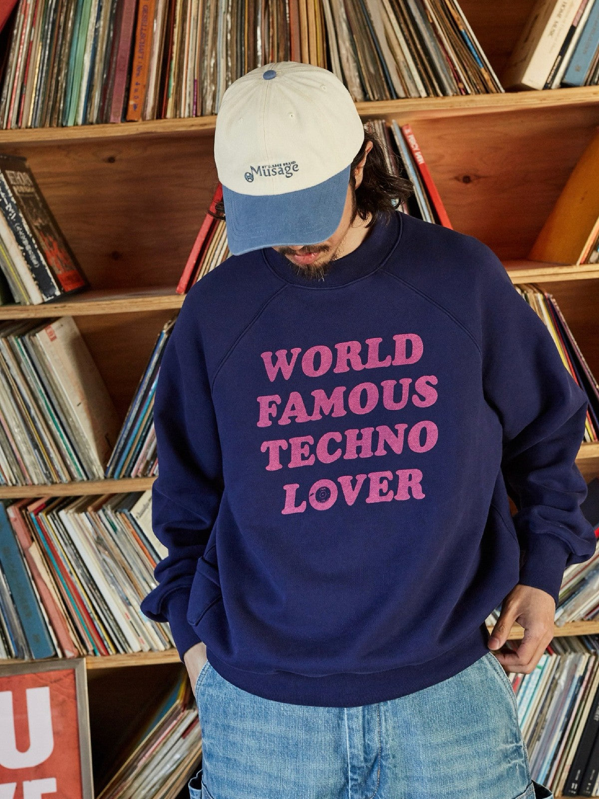 USAGE Heavyweight Raglan Graphic Sweatshirt in Navy Blue - On Male Model