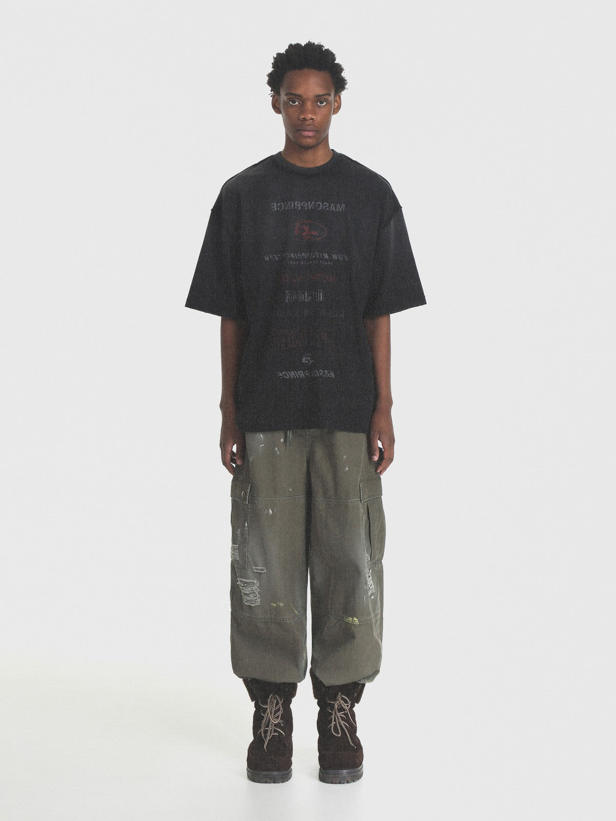 MASONPRINCE Distressed Typographic Cotton T Shirt in Black - On Male Model