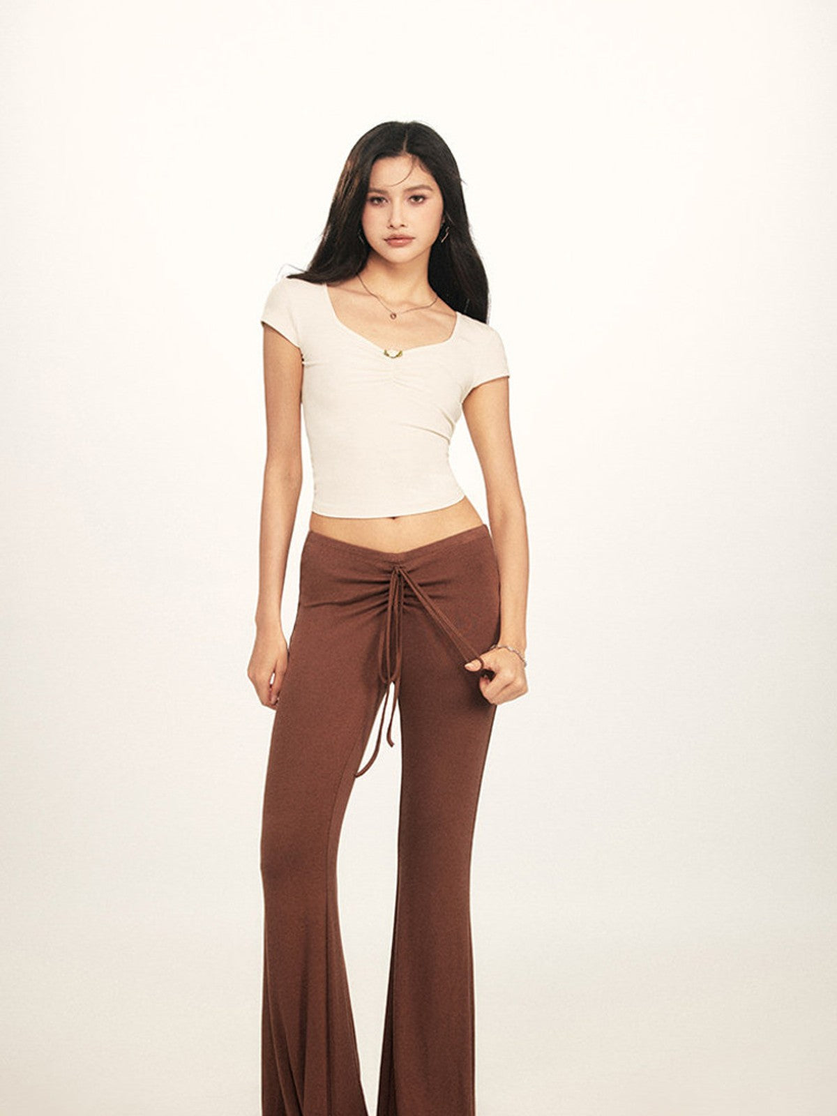 BEERBRO Twist Front Ruched Tee in White - On Female Model