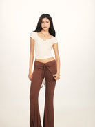 BEERBRO Twist Front Ruched Tee in White - On Female Model