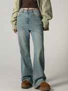 MASONPRINCE High Waisted Distressed Flared Jeans in Denim - On Female Model