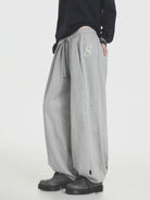 MASONPRINCE Wide Leg Inverted Pleat Sweatpants in Gray - On Model