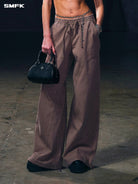 SMFK Wide Leg Cotton Cargo Sweatpants in Brown - On Model