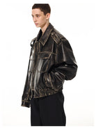 UNKNOWNWORLD Distressed Padded Eco Leather Jacket in Black - On Model