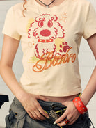 BEERBRO Puff Print Puppy Baby Tee in Cream - On Female Model